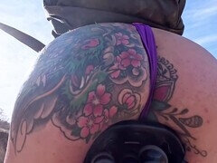 Exhibitionist with a juicy big butt shows off on a public biking trail