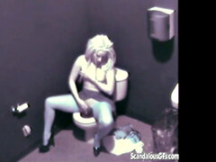 Blonde hottie masturbates in public toilet & gets naughty with a voyeur