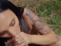 Tattooed Adel Asanty gives passionate outdoor blowjob
