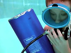 Hungarian beauty fucks a dildo underwater
