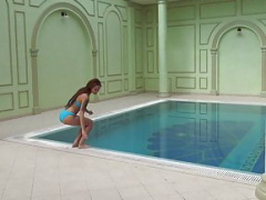 Adult star Mia Ferrari in blue bikini underwater