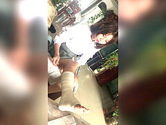 asian dame crutches with sprain ankle in fat bandage