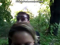 Blonde babe does blowjob in the forest
