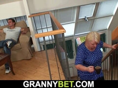 Check out this hot blonde granny with huge tits riding her big-dicked stud