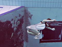 Cheh sexy redhead swimming naked
