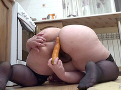 anal with a carrot in the kitchen. youthful bbw