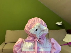 Sissy in diaper with bondage hood