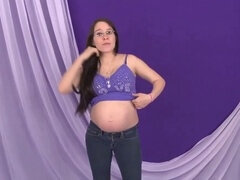 Pregnant Luna indulges in a softcore solo session for ebony babe lovers
