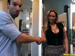 A MILF with a curvy ass and big boobs is thirsty for a cock.